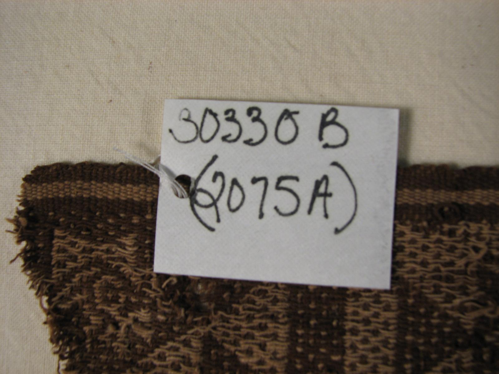 39067