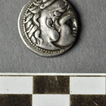 164703