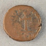 323076