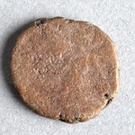 329077