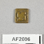 864577
