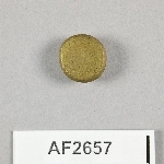864697