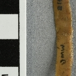 940077